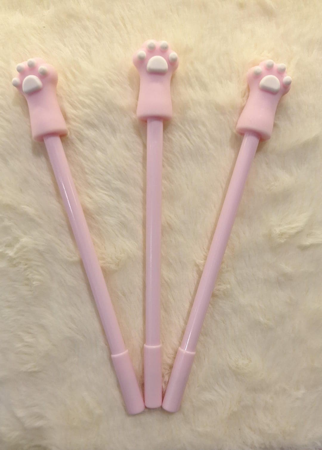 CANETA GEL .:Patinha maior rosa/preto